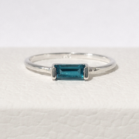 Silver ring with a london blue topaz gemstone 