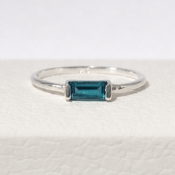 Silver ring with a london blue topaz gemstone 
