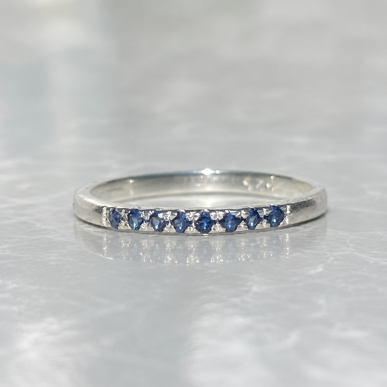 Blue Sapphire Half Eternity Ring